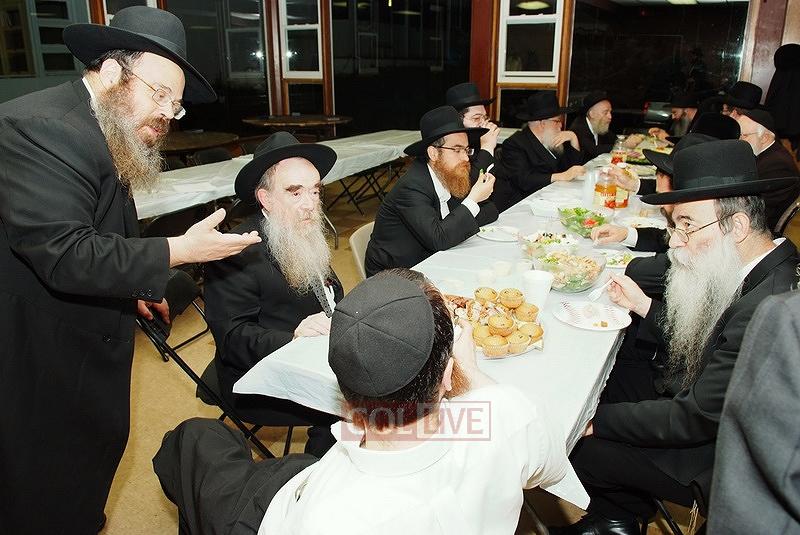 Kiryat Gat Mashgiach Rabbi MM Groner (L) with guests